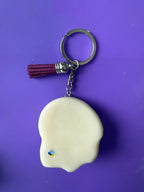 Ghost Glow Worry Stone keychain